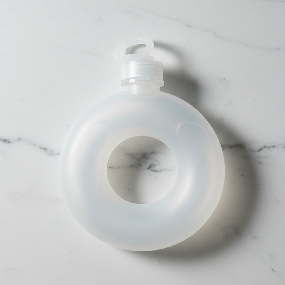White bottle ring on a marble surface