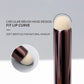 Lipstick brush with circular brush head design on a gray background